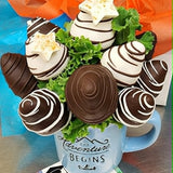 Chocolate covered strawberries in a mug